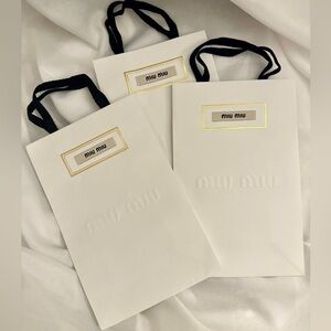Miu Miu White Shopping Bags with Black Handles and Gold Trim